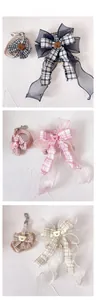 Detailed tile display of bear plaid pet harness sets with lace ribbons in three colors