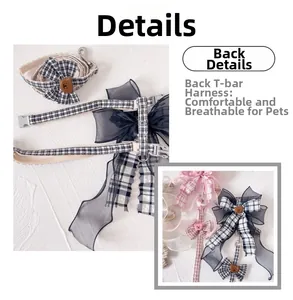 Detail of adjustable plaid pet harness with mesh bow and bear motif on white background