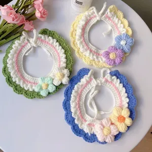 Handmade crochet pet floral collars in green, yellow, and blue colors for cats and dogs
