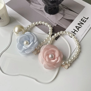 Elegant pet pearl necklace with camellia flower and heart charm for cats and dogs