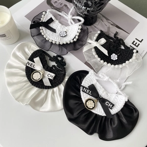 Elegant black and white hand-knitted pet collars with lace, pearls and camellia charms