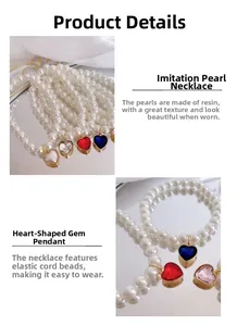 Detail of beaded pet collar with heart crystal pendant and elastic resin faux pearls