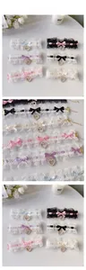 Detail of sweet Lolita lace pet collars with heart-shaped pearl pendants in various colors