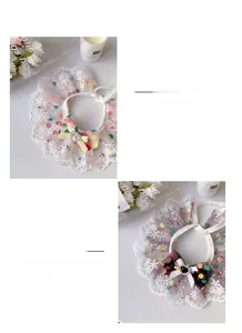 Close-up of polka dot lace pet collars with heart gems and elegant bows in macro view