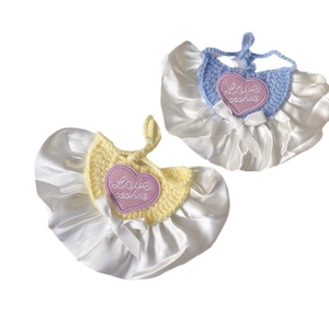 Cute crochet pet bib set with heart embroidery and bow details in yellow and blue