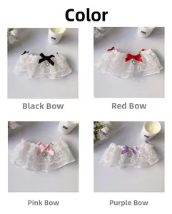 Detail view of double-layer lace pet bibs with heart pendants in four elegant colors
