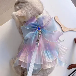Detail of mermaid pet harness dress with giant bow and rhinestone sapphire accent