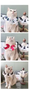 Three-style floral pet bib collars with lace trim and satin bows on white cat