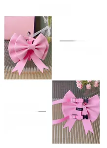 Detailed view of pink pet harness featuring a large 3D bow and secure buckle