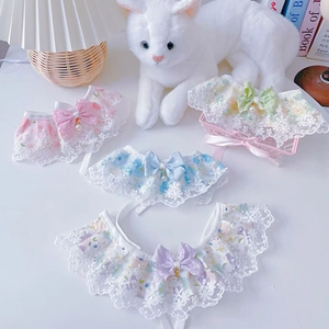 Lace pet collars with bows and pearls in pink, blue, purple, and green pastel colors