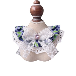 Floral blueberry pet collar with white lace bow and purple gem on white backdrop