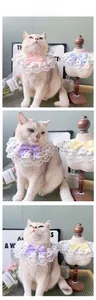 Detail view of floral lace pet collars with large satin bows for cats and small dogs