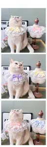 Detailed view of floral lace pet collars with bowknot on a white cat model