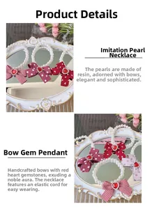 Detail of pearl pet necklace with red ribbon bow and heart gemstone on white mirror
