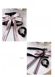 Close-up of pink bow pet harness with Just for You lettering and lace trim