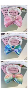 Macro detail of pet collars with sequined bows and faux pearls on a decorative background