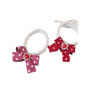 Charming pet pearl necklace with red ribbon bow and heart gemstone for dogs and cats