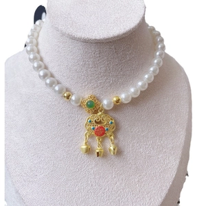 Traditional pet pearl necklace with lucky lock pendant and gold bells for cats and dogs