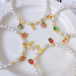 Handmade pet pearl necklace with lucky mahjong pendants and golden festive charms
