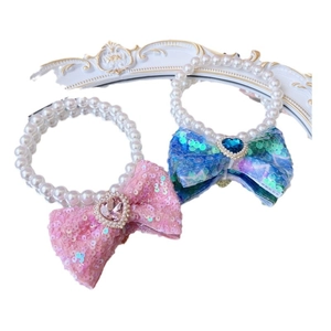 Sparkly sequin bow pet necklace with lustrous pearls and heart gems for cats and small dogs