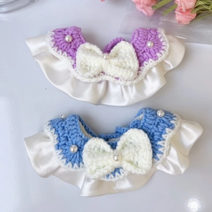 Knitted pet collar with blue and purple bows, satin ruffles and pearl accents