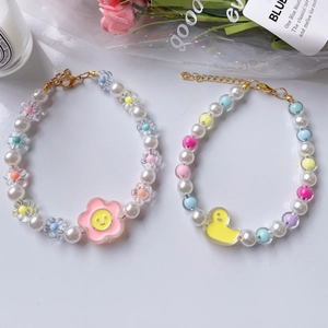Adjustable pet pearl necklace with colorful flower charms for small cats and dogs