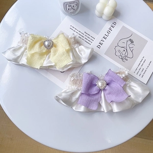 Handmade pet lace collars with ribbon bows and pearl hearts for cats and dogs in cream colors