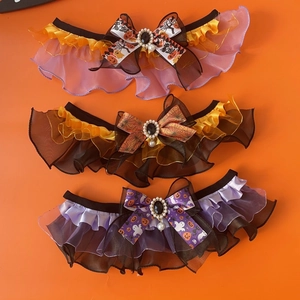 Detailed set of Halloween pet collars with lace bows and festive holiday patterns