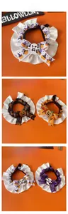 Tile display of Halloween pet collars with pumpkin charms and colorful satin ribbons