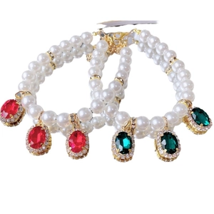 Elegant double-layer pearl pet necklace with sparkling red and green gemstone pendants