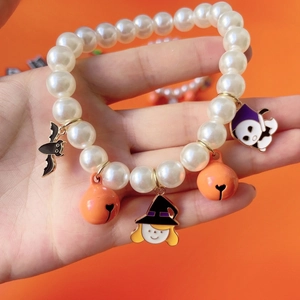 Halloween pet pearl necklace with colorful spooky charms and orange bells for cats and dogs