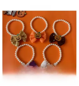 Detailed set of 5 Halloween pet pearl necklaces with sequin bows and pumpkin charms