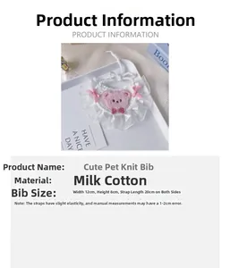 Macro detail of milk cotton pet bib with pink bear embroidery and lace borders