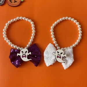Halloween pet pearl necklace set with cute cartoon ghost bows and pumpkin theme colors