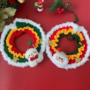 Handmade crochet Christmas pet scarf with festive Santa and snowman figures on red background
