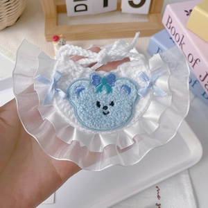 Handmade crochet pet bib with delicate lace trim and cute blue bear embroidery