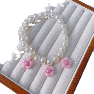 Handmade pet pearl necklace with pink sunflower charms for cats and small dogs