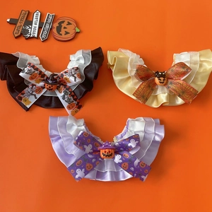 Three-piece Halloween pet lace collars with pumpkin and ghost motifs on orange background