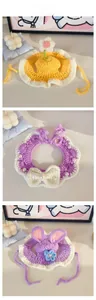 Detailed view of handmade sunflower and bunny ear crochet pet hats with pearl bow accents