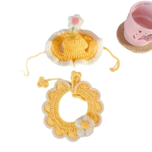 Handmade crochet pet hat and bib set with daisy flower design for small cats and dogs