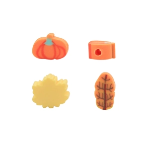 DIY colorful polymer clay beads in pumpkin and maple leaf shapes for autumn jewelry making