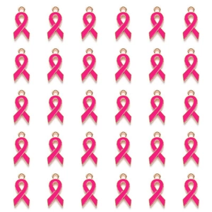 Macro view of 30 pink ribbon alloy charms with gold plating for DIY jewelry making