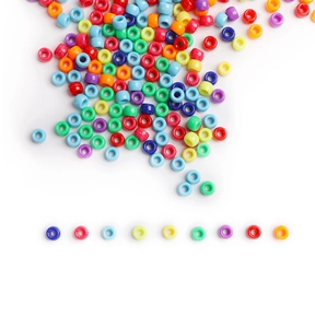 Macro di perle in acrilico colorate con texture liscia per creazione di gioielli fai-da-te