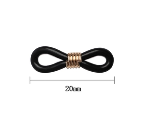 Detailansicht der 20mm Brillen-Silikonschlaufen mit goldenen Metall-Federwicklungen