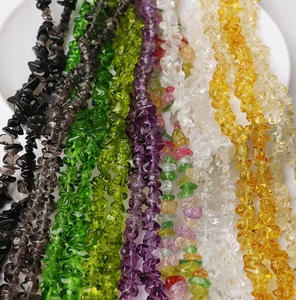 Macro view of assorted colorful natural crushed stone beads for DIY jewelry making