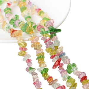 Polished natural irregular gemstone beads for DIY jewelry making in a white ceramic dish