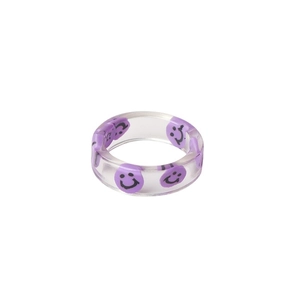 Minimalist clear resin ring with purple smiley faces in a trendy Y2K aesthetic style