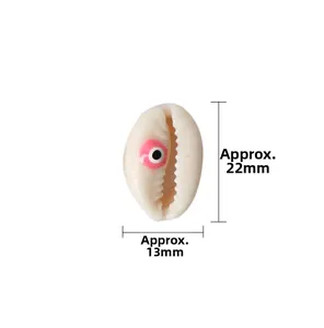 Macro detail of natural shell evil eye beads measuring 22x13mm for DIY jewelry making