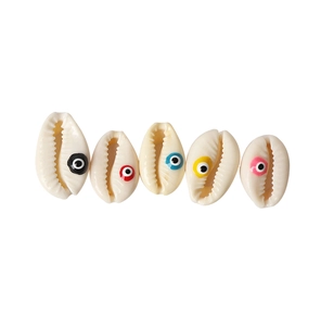 Macro detail of natural shell charms with colorful evil eye beads for DIY jewelry making