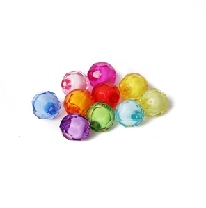 Macro detail of colorful faceted acrylic beads for DIY jewelry and bracelets